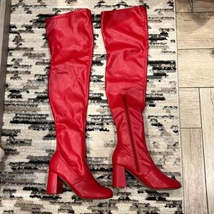 Red leather high boots